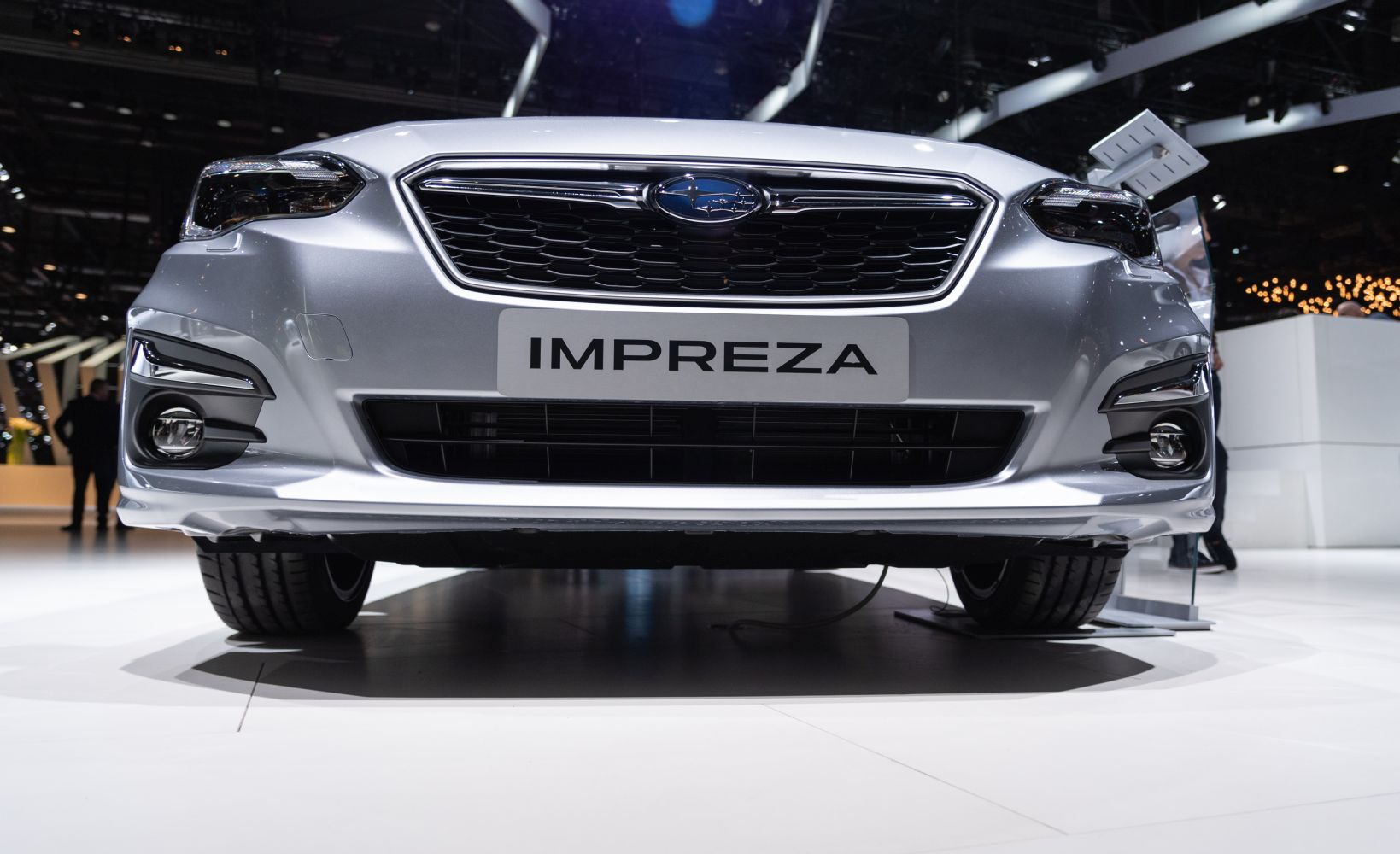Front grille and sleek headlights of a modern hatchback