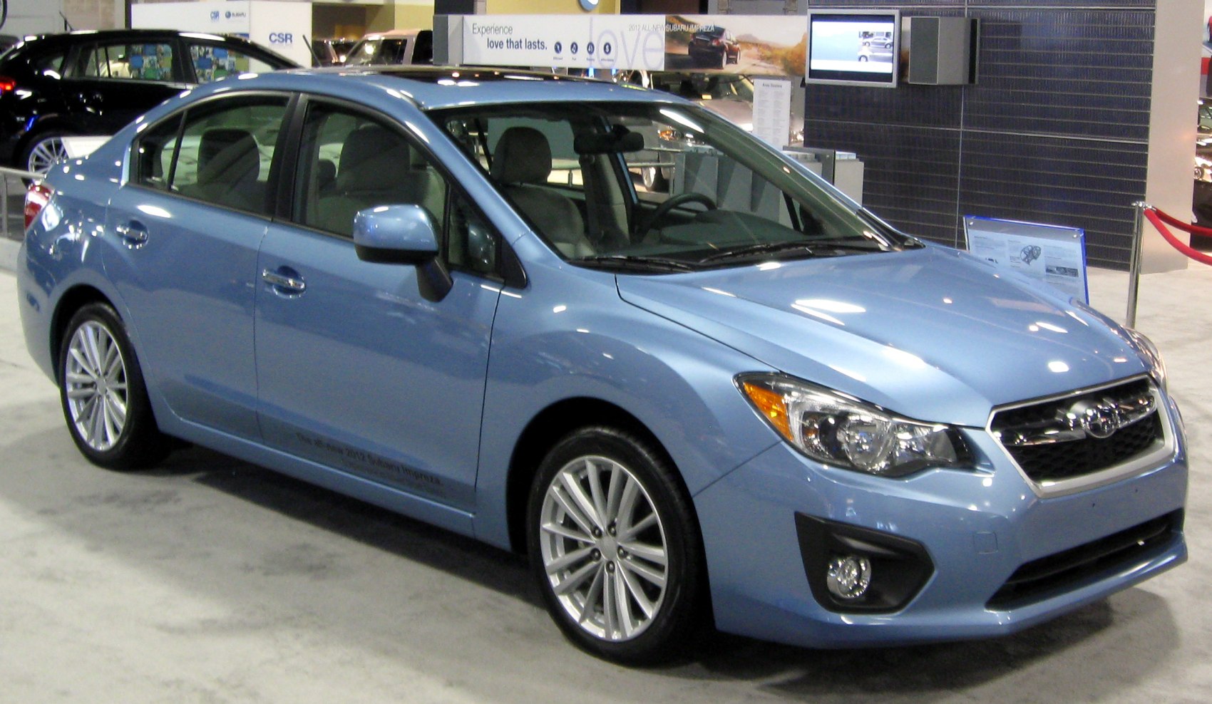 Four-door sedan with projector headlights and alloy wheels