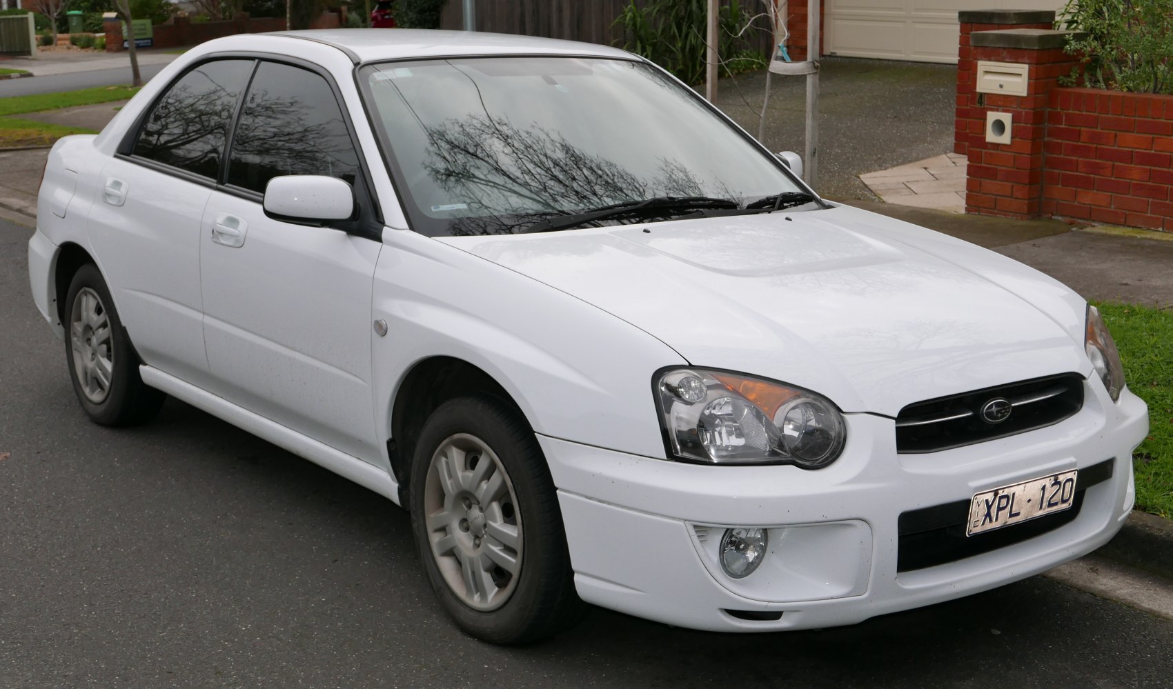Front exterior and headlamp design of a sedan