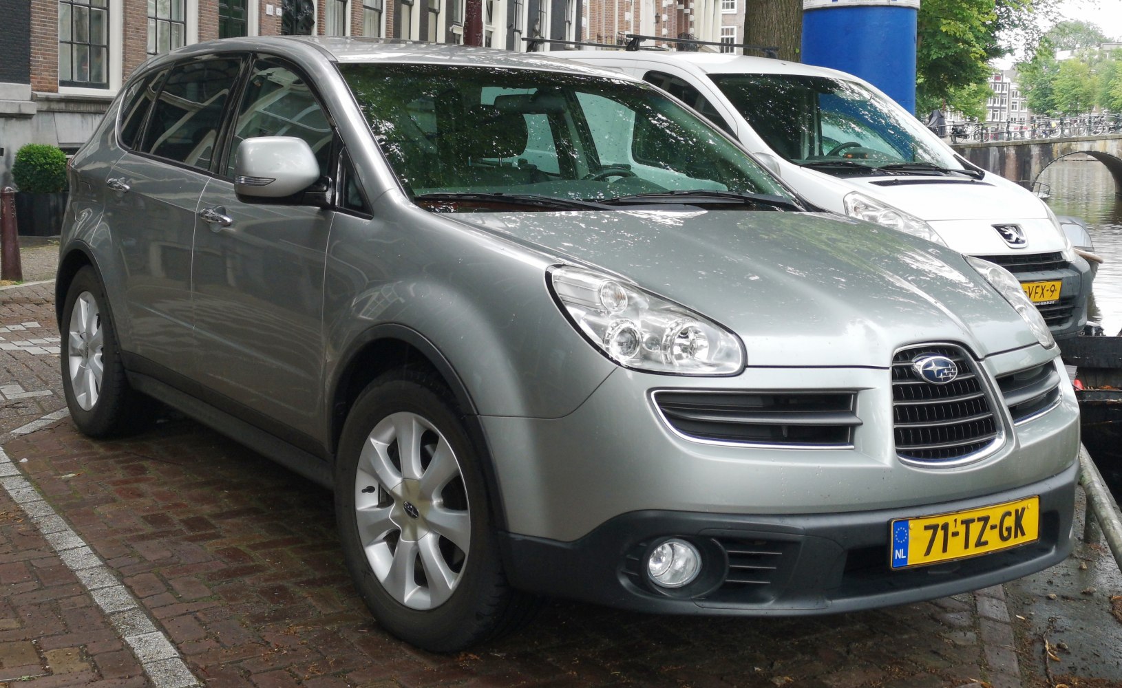 Front-side view of SUV with distinct grille and headlights