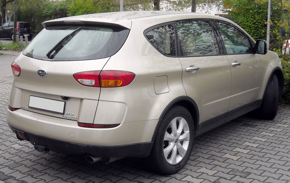 Rear view of SUV with distinctive tail lights and rear wiper