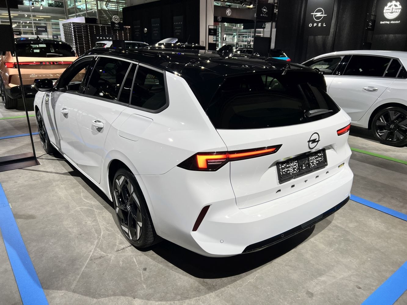 Modern white wagon with black roof and LED rear lights