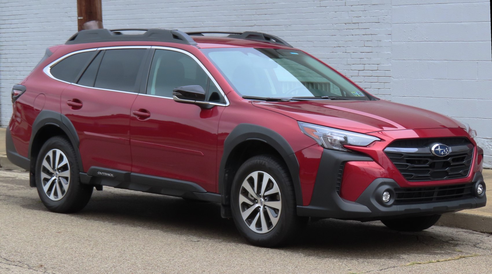 Red SUV with rugged wheel arches and modern headlights
