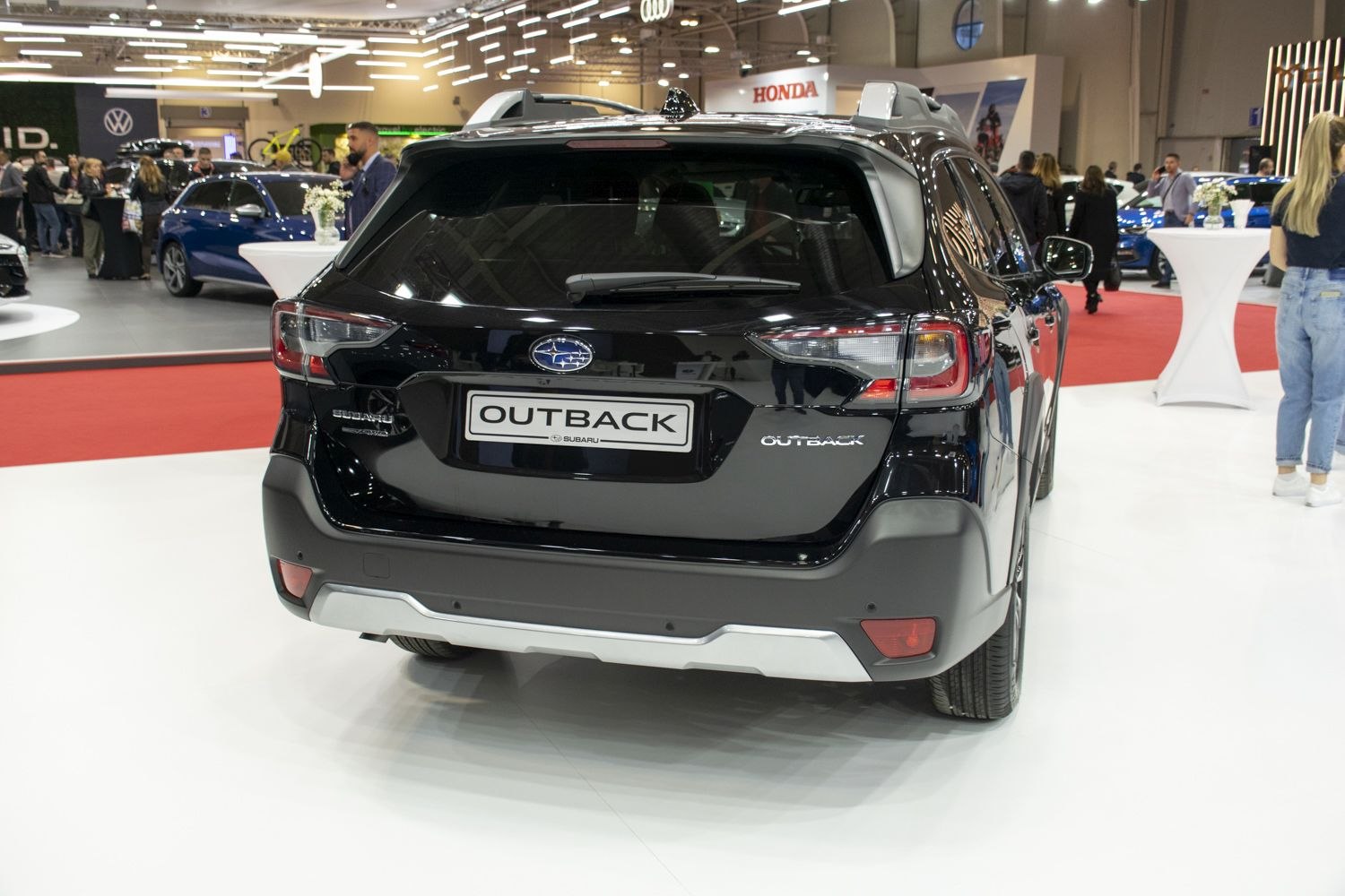 Rear view with taillights and bumper of a black SUV