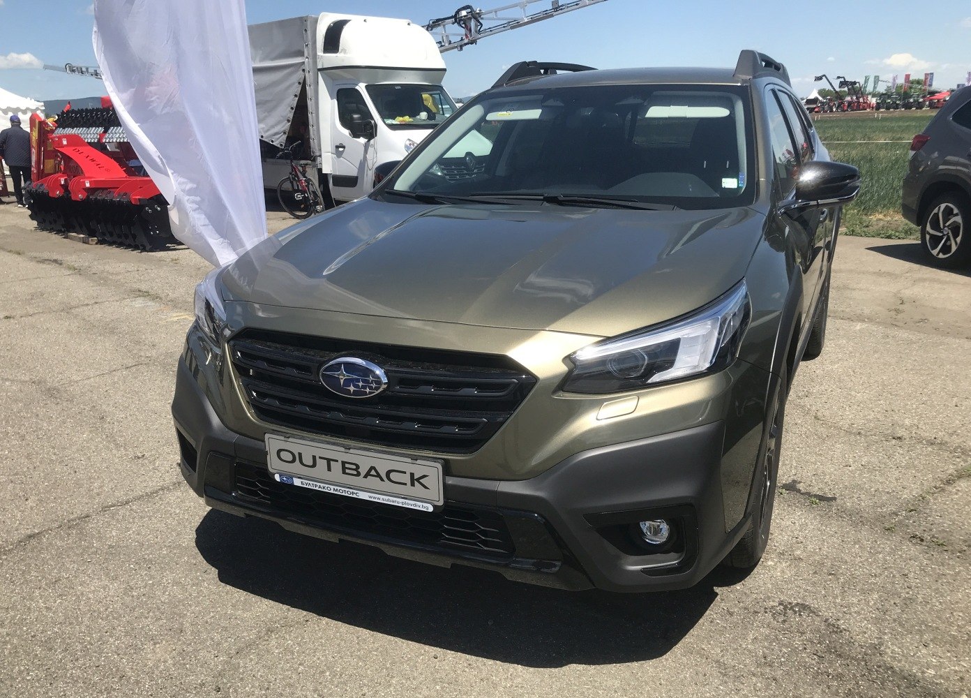 Front view with modern headlights and robust grille design