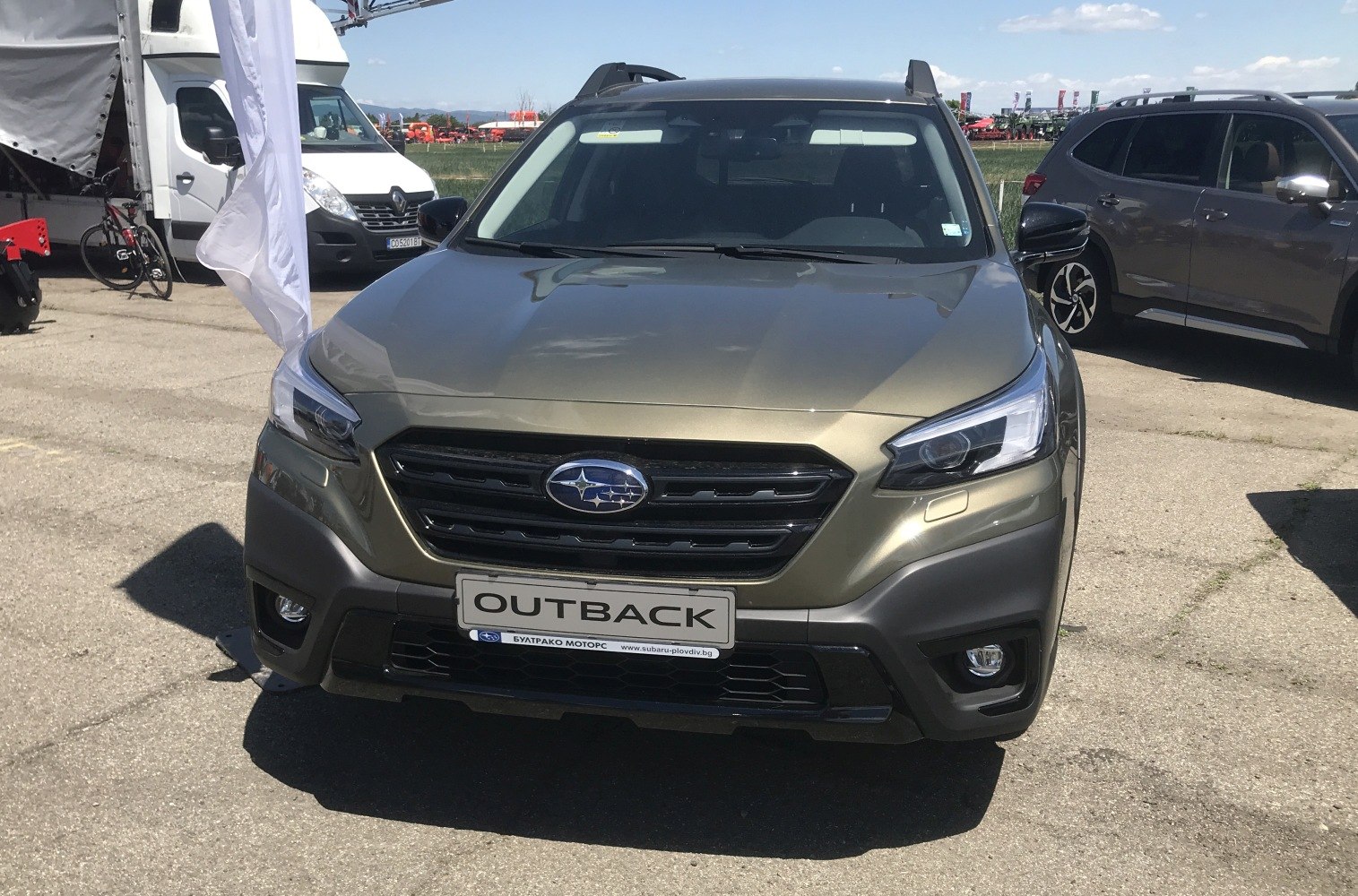 Front view with LED headlights and bold grille design