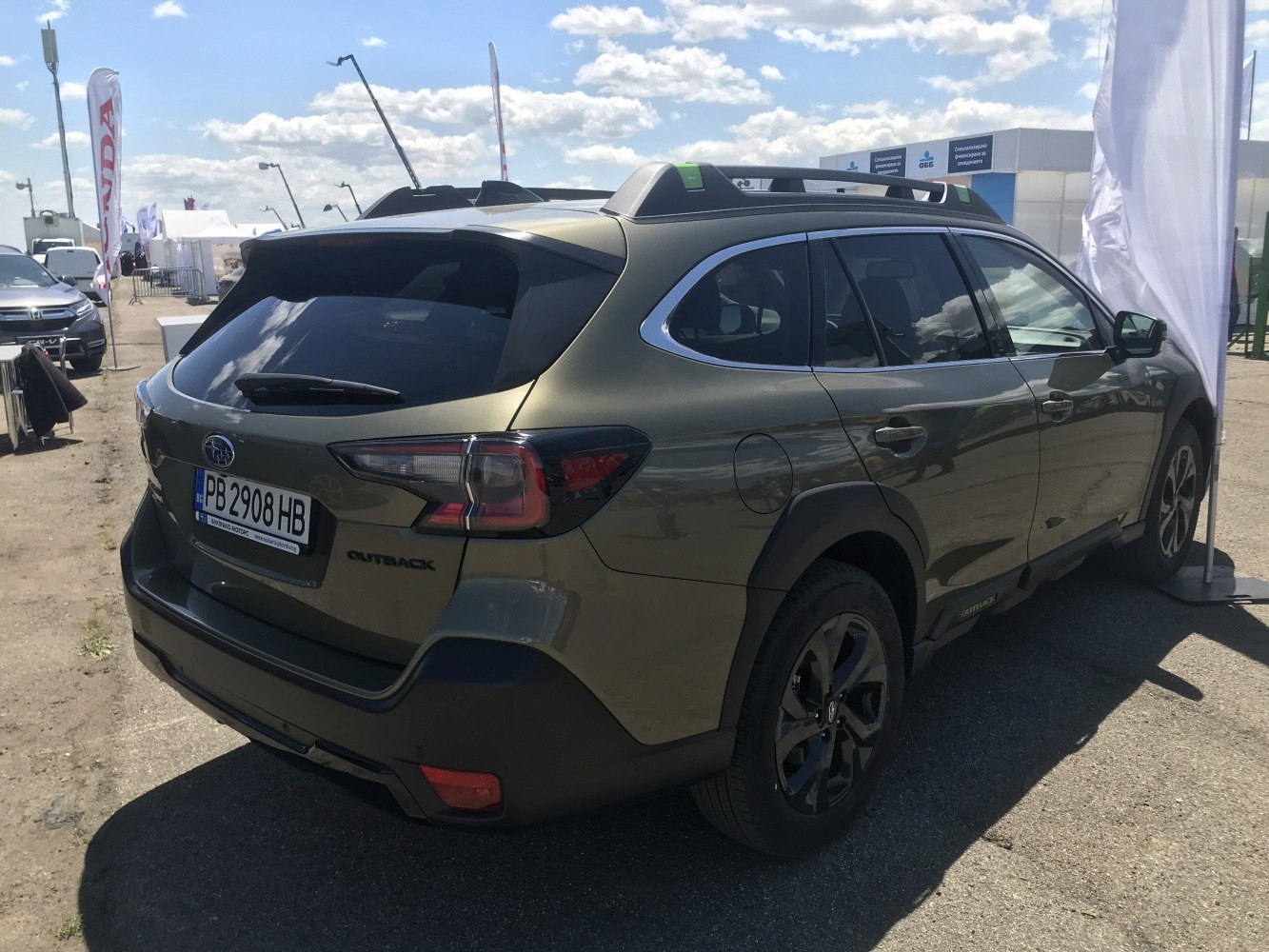 Rear and side view with roof rails and modern tail lights