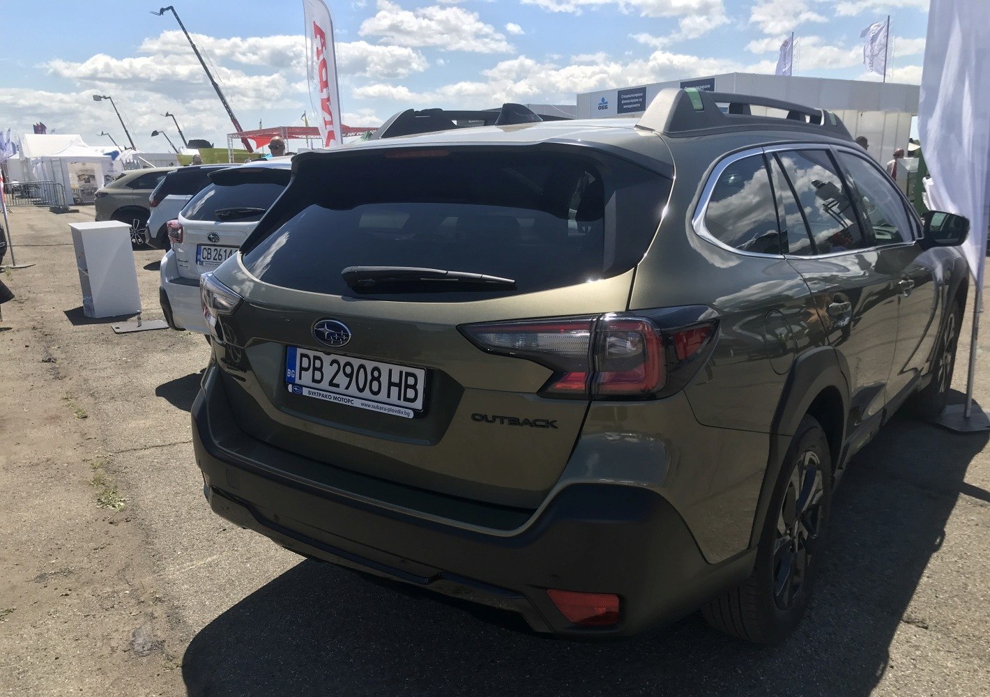 Rear view of SUV with distinct taillights and roof rails