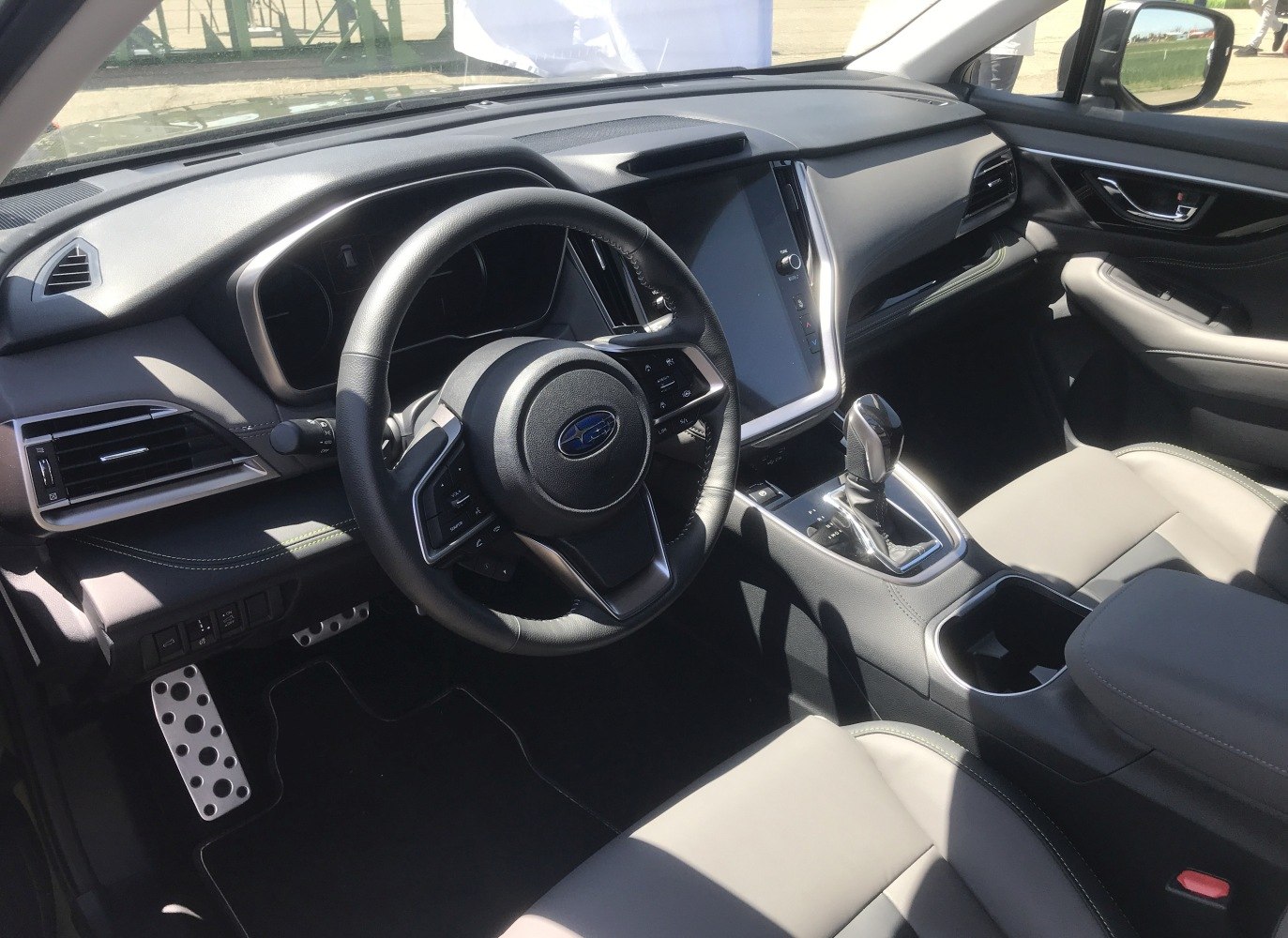 Dashboard, steering wheel, and center console of a modern car interior