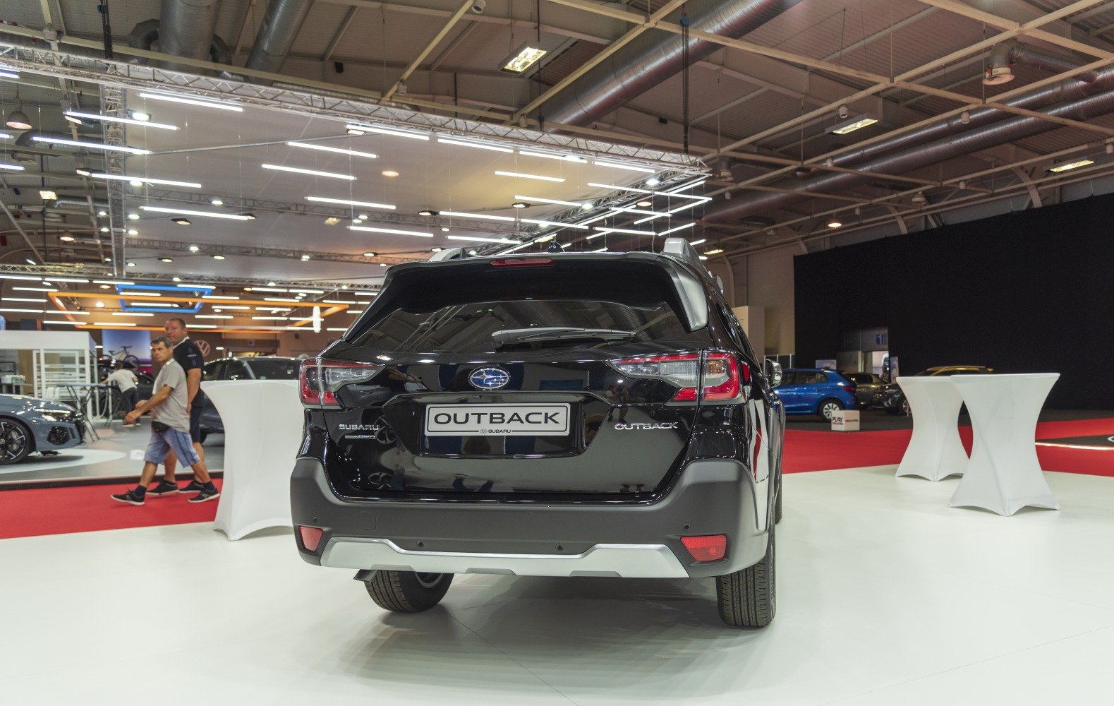 Rear view of black SUV with detailed tail lights and rear bumper