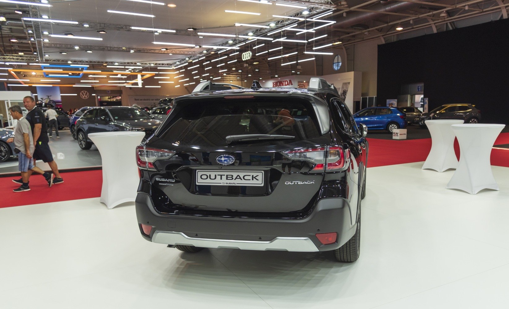 Rear view of SUV with modern tail lights and roof rails