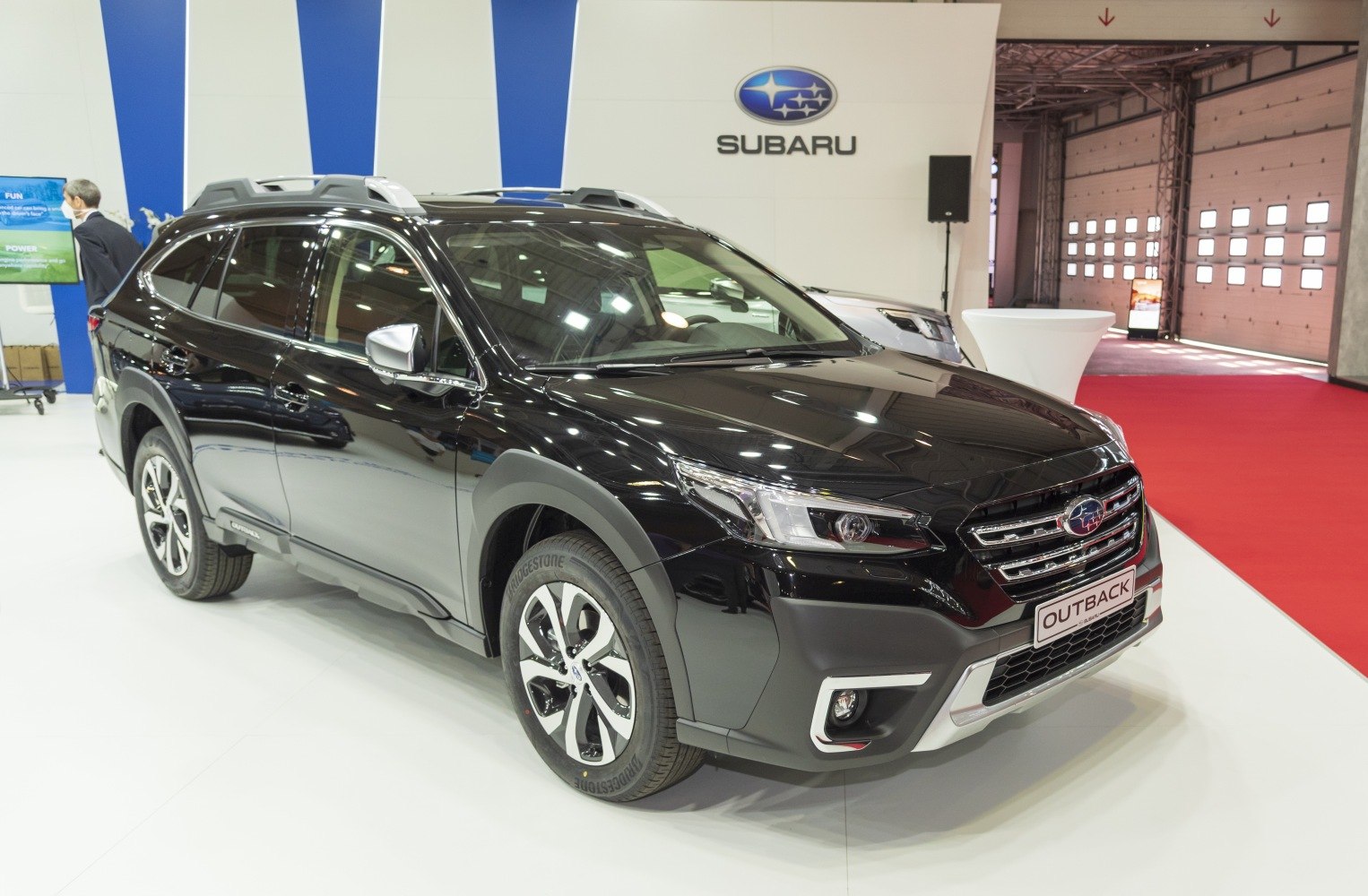 Front three-quarter view of a modern SUV with distinctive headlights and grille