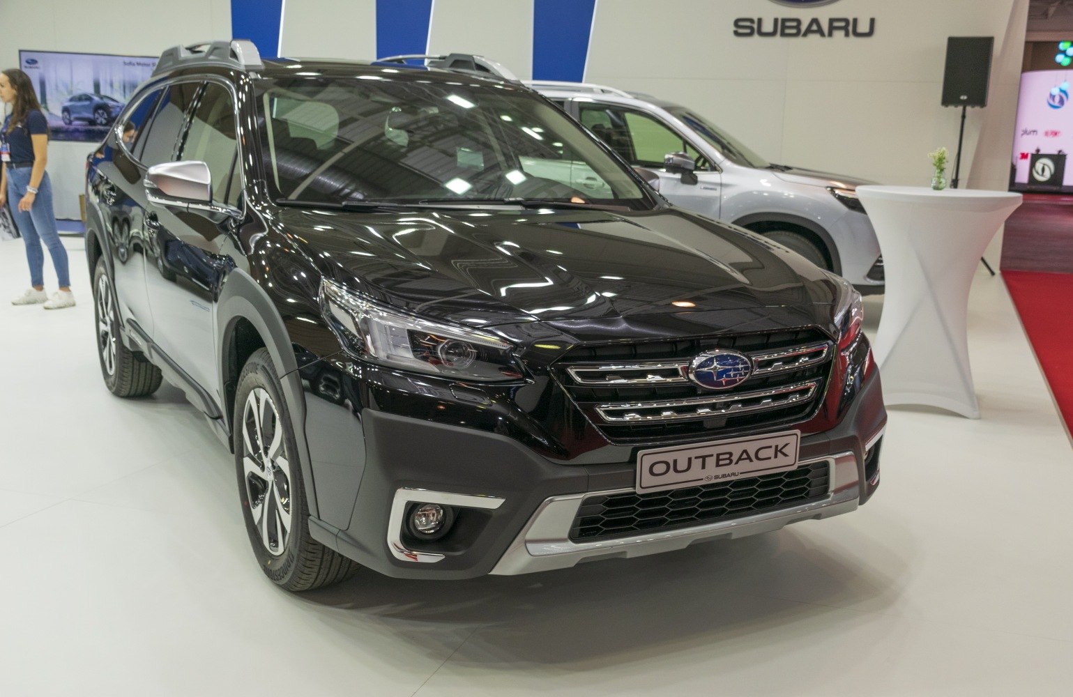Front view of SUV with LED headlights, roof rails, and alloy wheels
