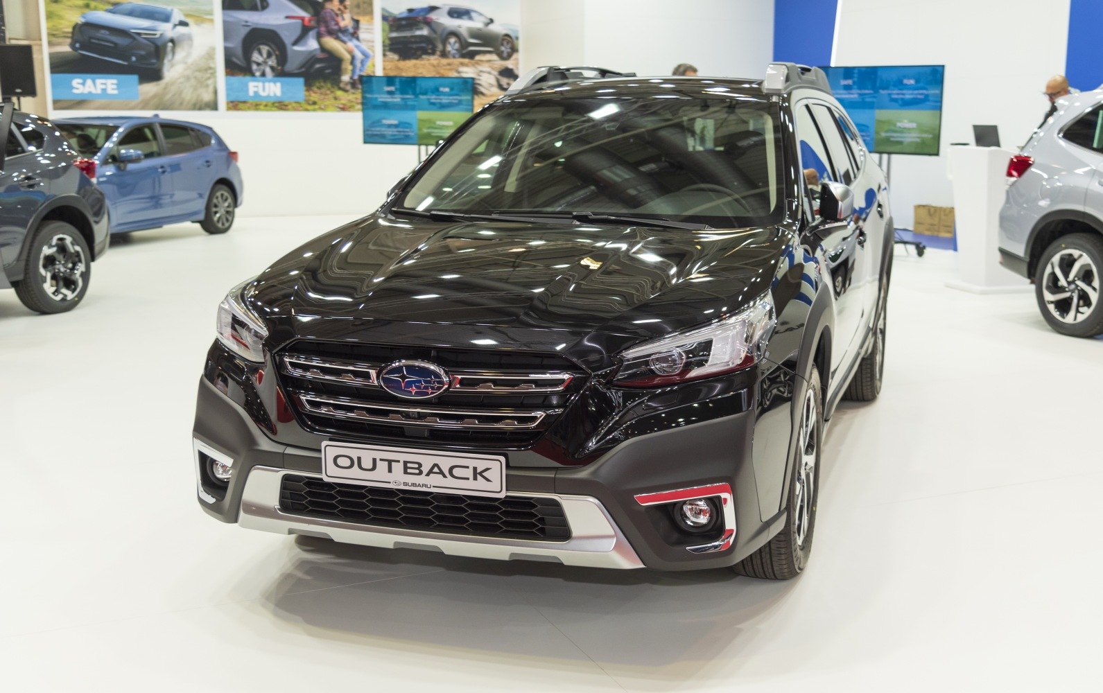 Front grille and headlights of a black crossover vehicle