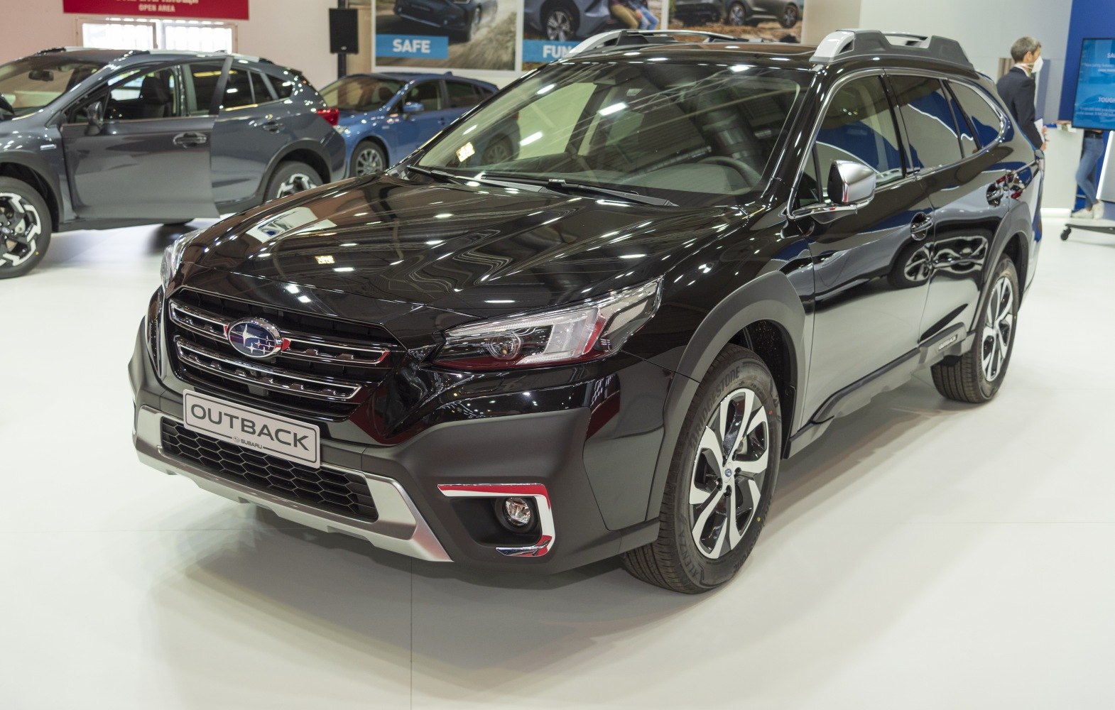 Black SUV front side view with LED headlights and alloy wheels