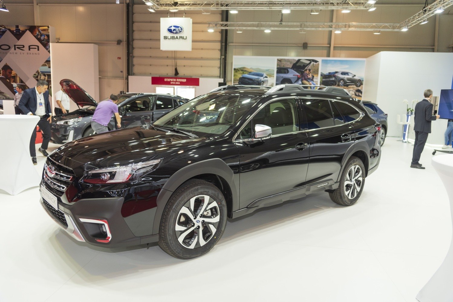 Black SUV with roof rails and modern alloy wheels