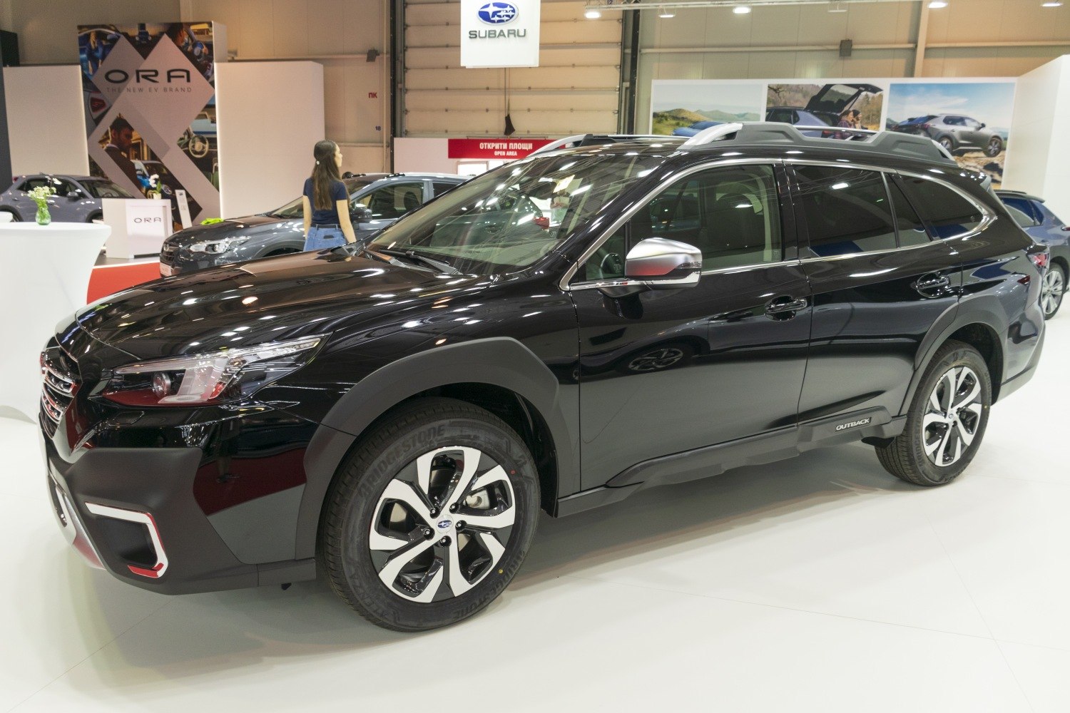 Side profile of SUV with alloy wheels and roof rails
