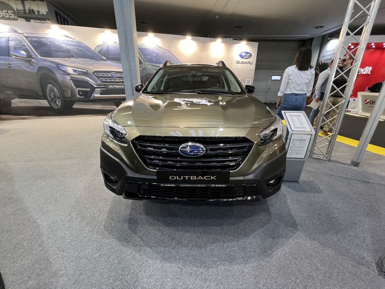 Front view of Subaru Outback with grille and headlight details