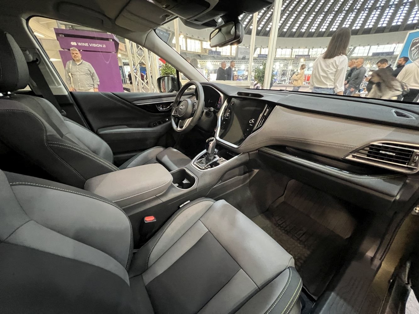 Modern car interior with touchscreen display and premium seats