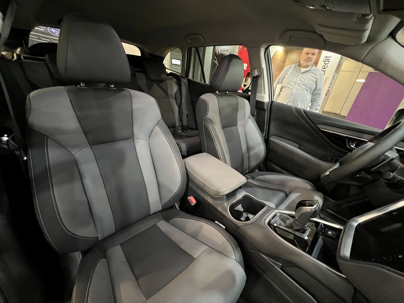 Front car seats and center console with dashboard and gear shifter