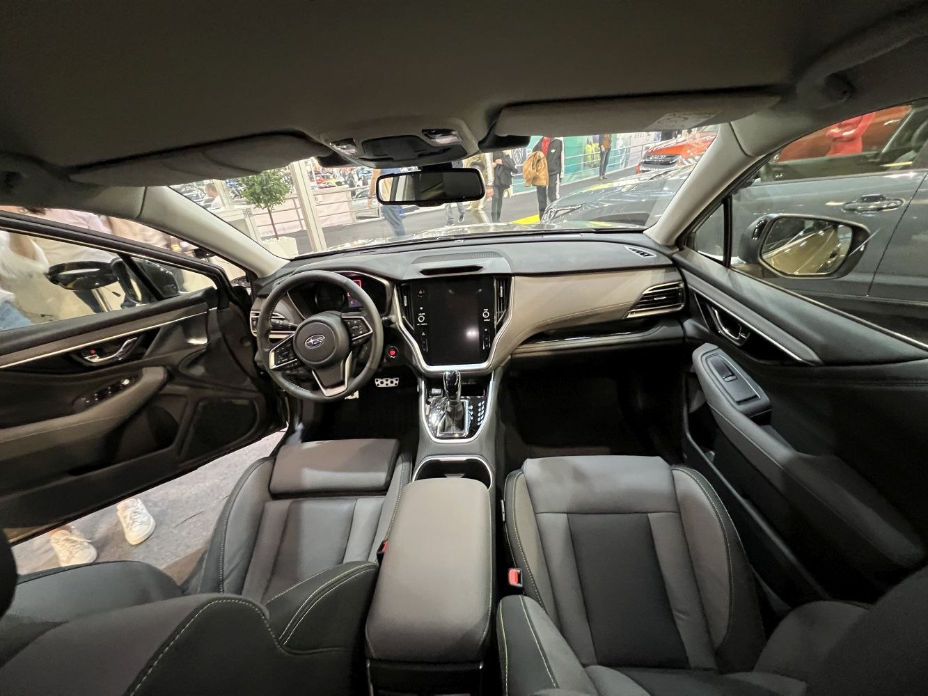 Modern car interior with digital dashboard and comfortable seats