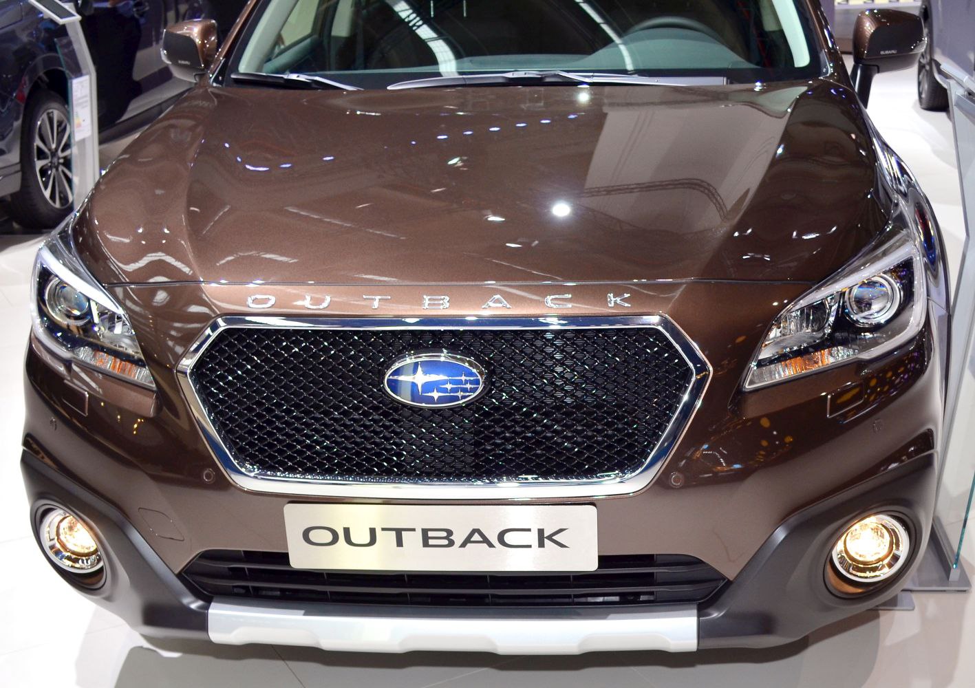 Front grille with Subaru emblem and sharp headlights