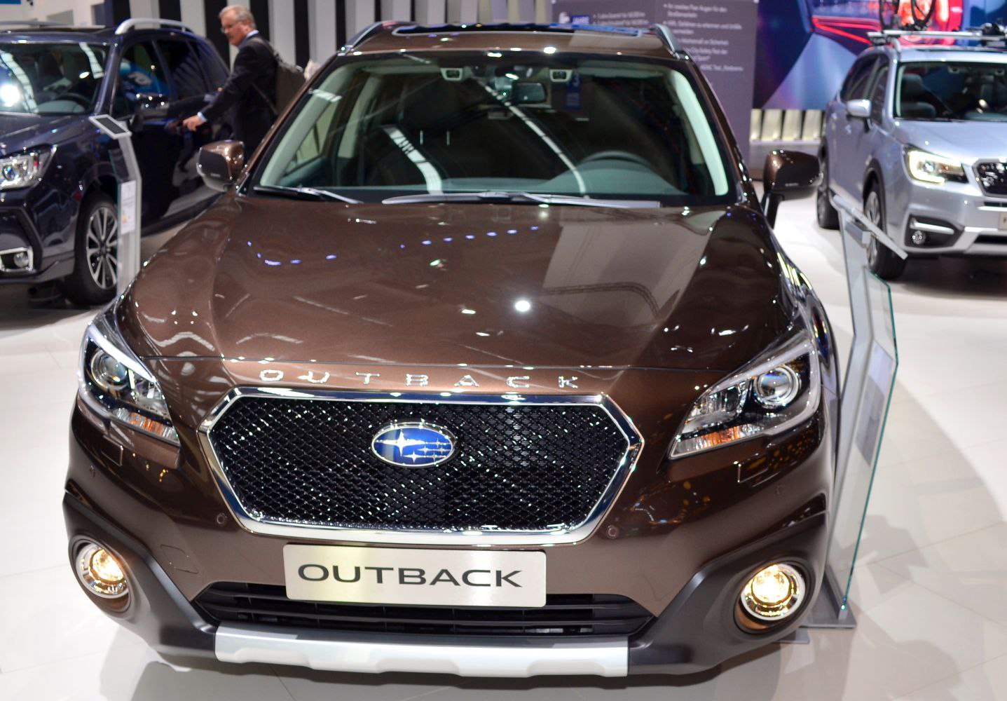 Front view with hexagonal grille, LED headlights, and fog lights