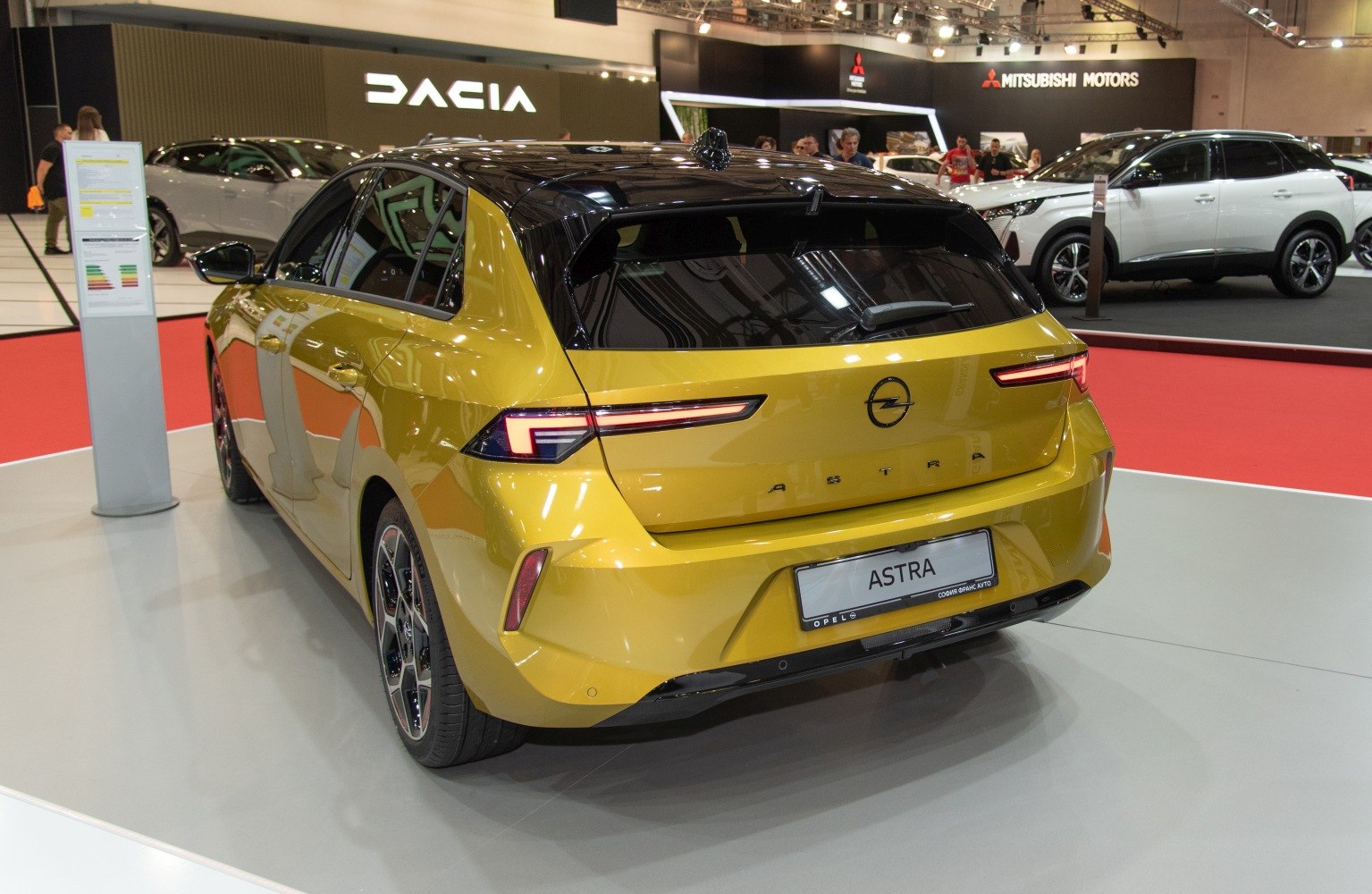Modern rear hatchback view with LED taillights and two-tone roof