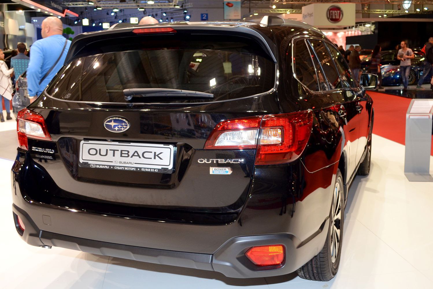Rear view of black vehicle with taillights, rear wiper, and Boxer Diesel badge