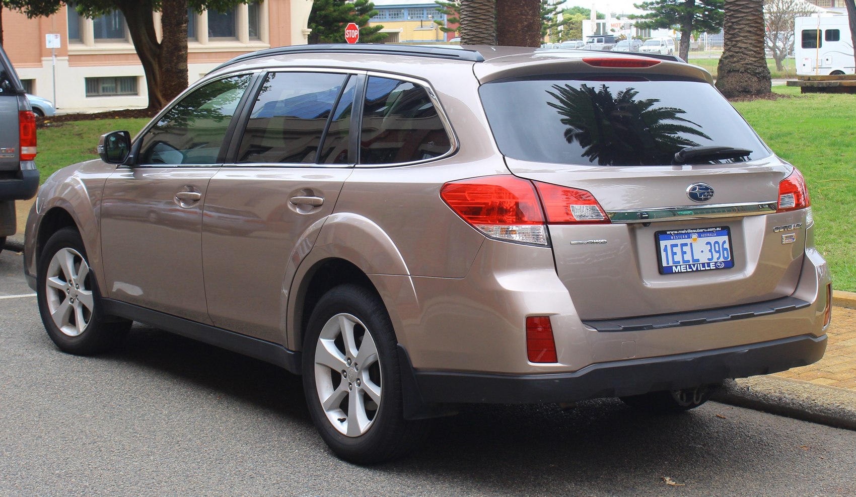 Rear and side view of an SUV with distinctive taillights and alloy wheels