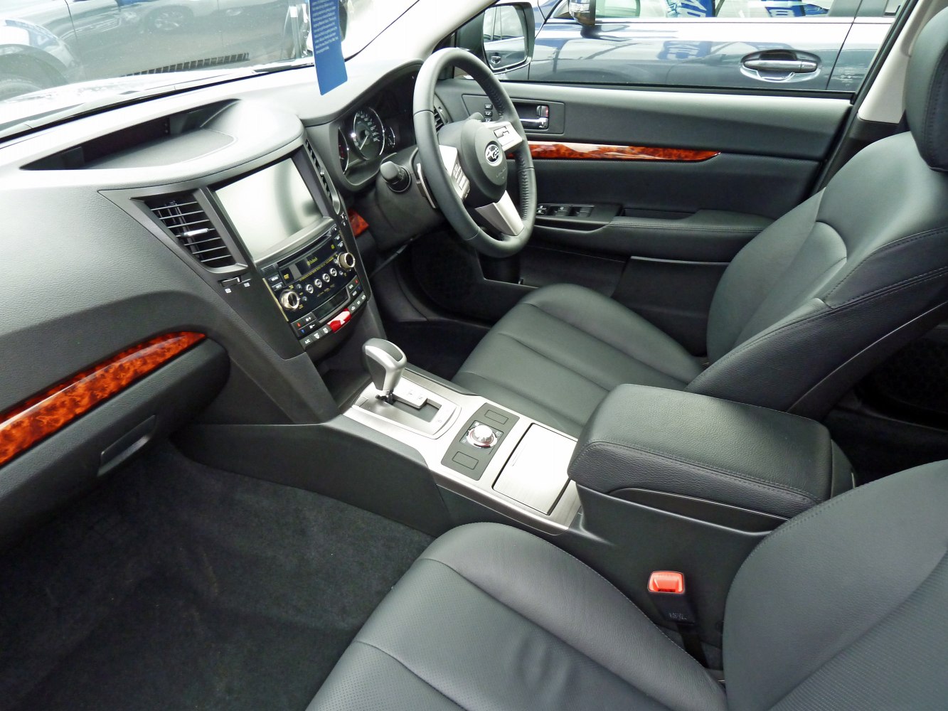 Dashboard, center console, leather seats, steering wheel