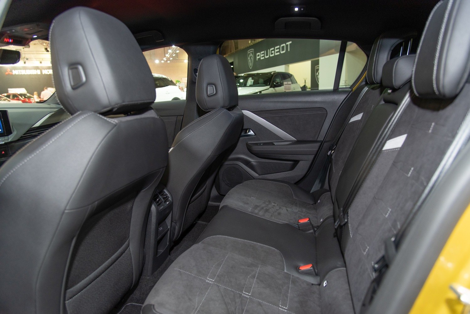 Rear seating with modern upholstery and door panel design