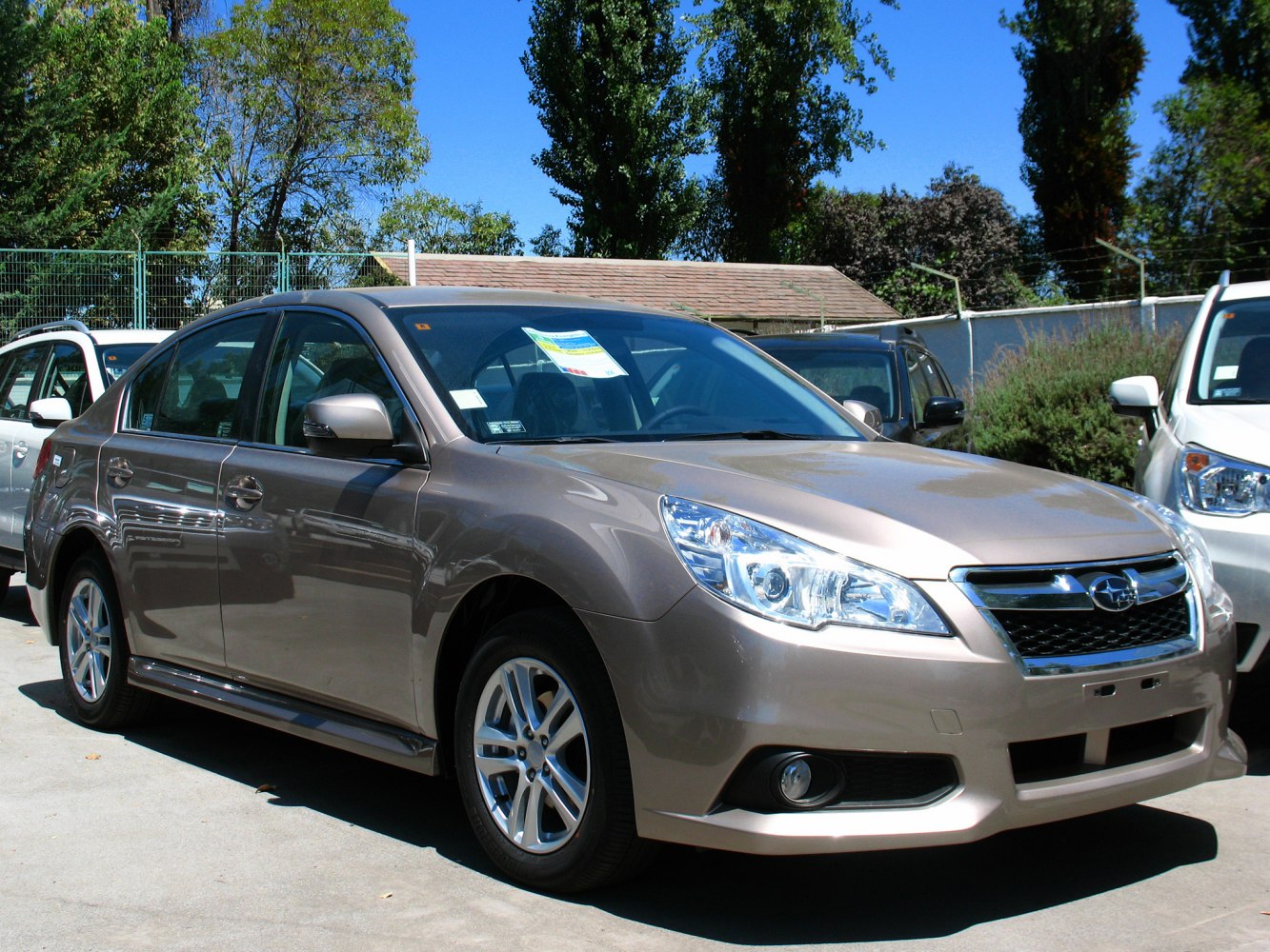 Front angle view showcasing headlights and front grille