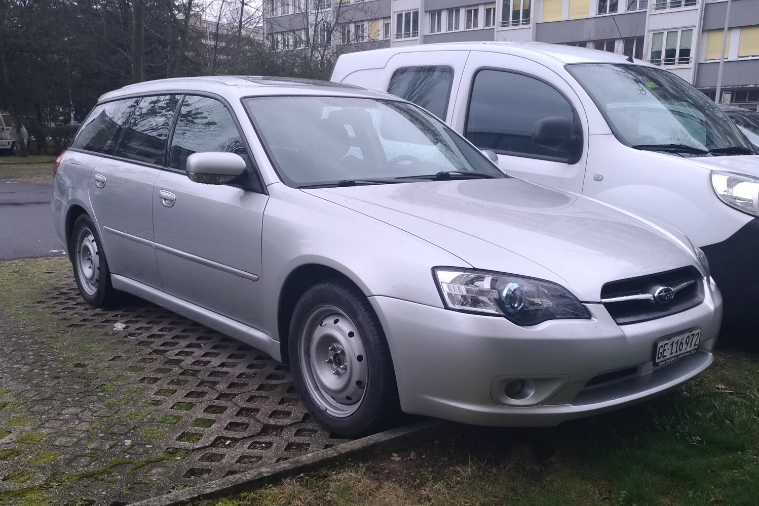 Silver station wagon with steel wheels and distinctive front headlights