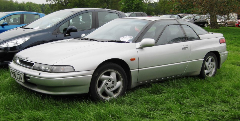 Silver coupe with unique pillarless window design and smooth aerodynamic styling