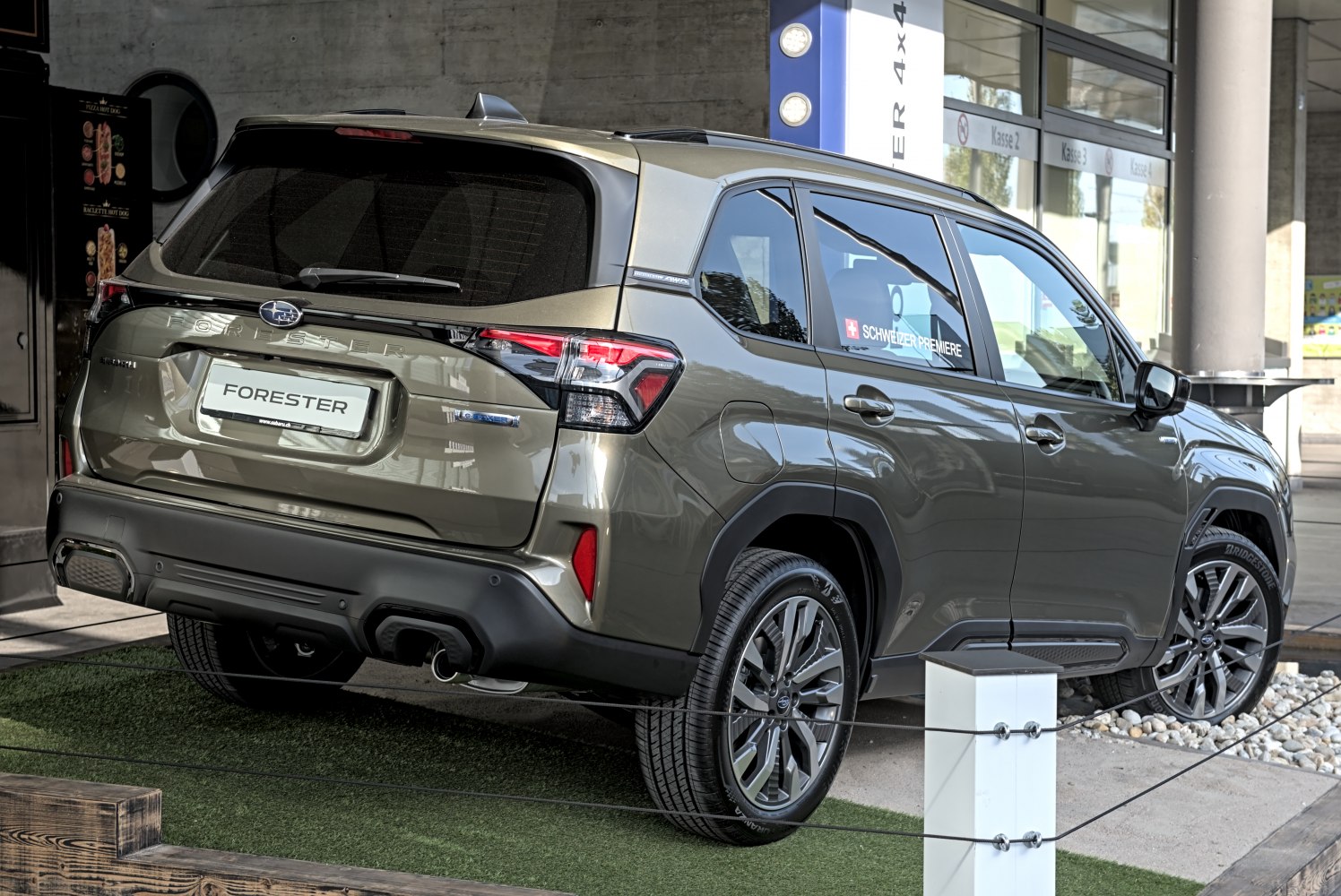Rear view of SUV with modern tail lights and rugged bumper design