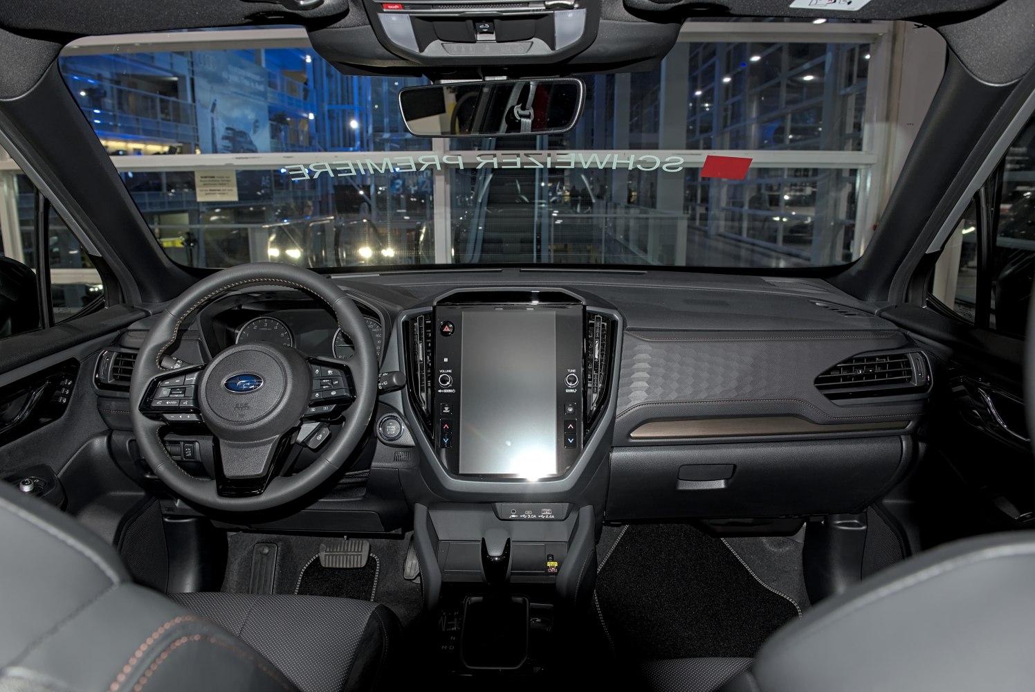 Interior with touchscreen dashboard and multifunction steering wheel