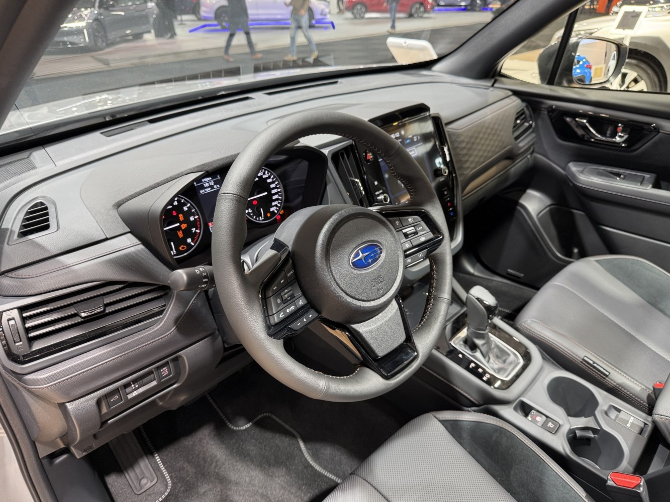 Modern car interior with dashboard and steering wheel controls