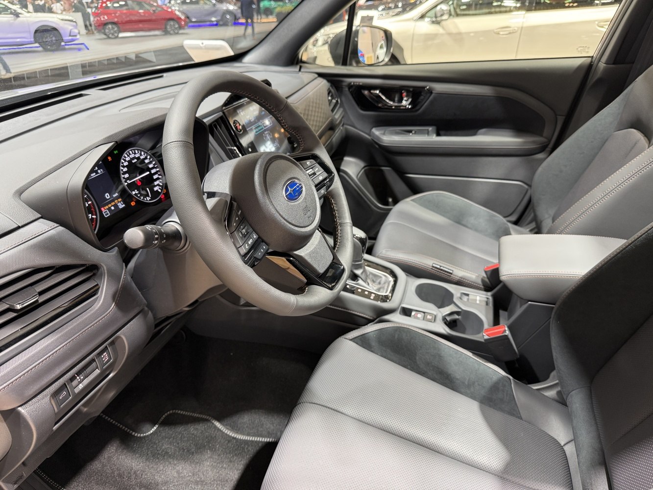 Modern car interior with digital dashboard and multifunction steering wheel