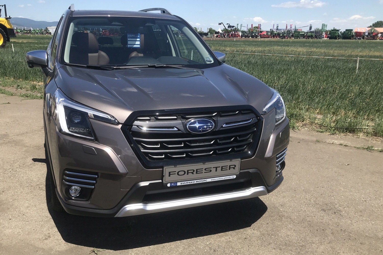 Front view showcasing LED headlights and grille of modern SUV