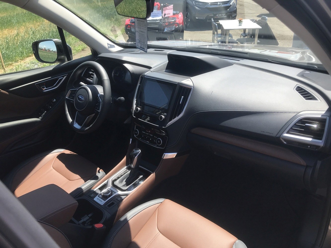 Modern dashboard and touchscreen infotainment in car interior