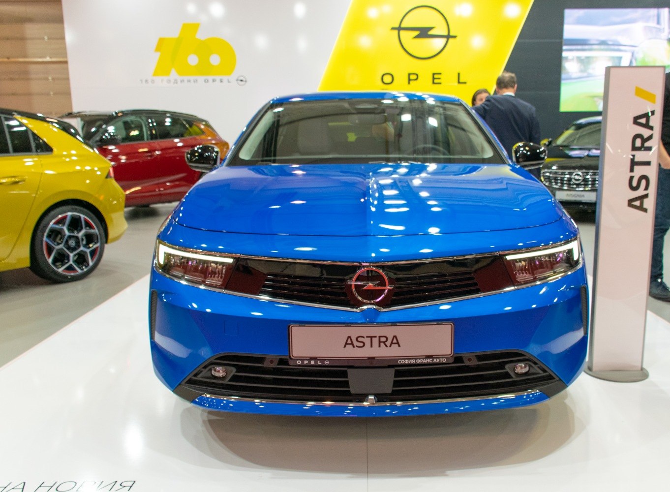 Front view highlighting sleek grille and LED headlights.