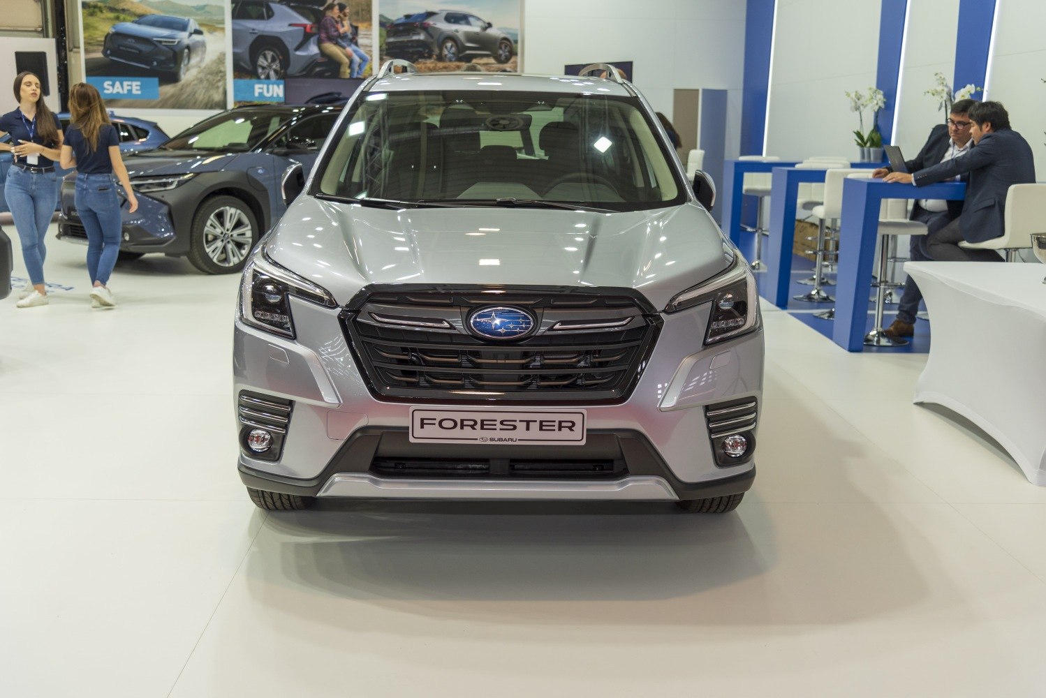 Front view of a modern SUV with prominent grille and headlight design