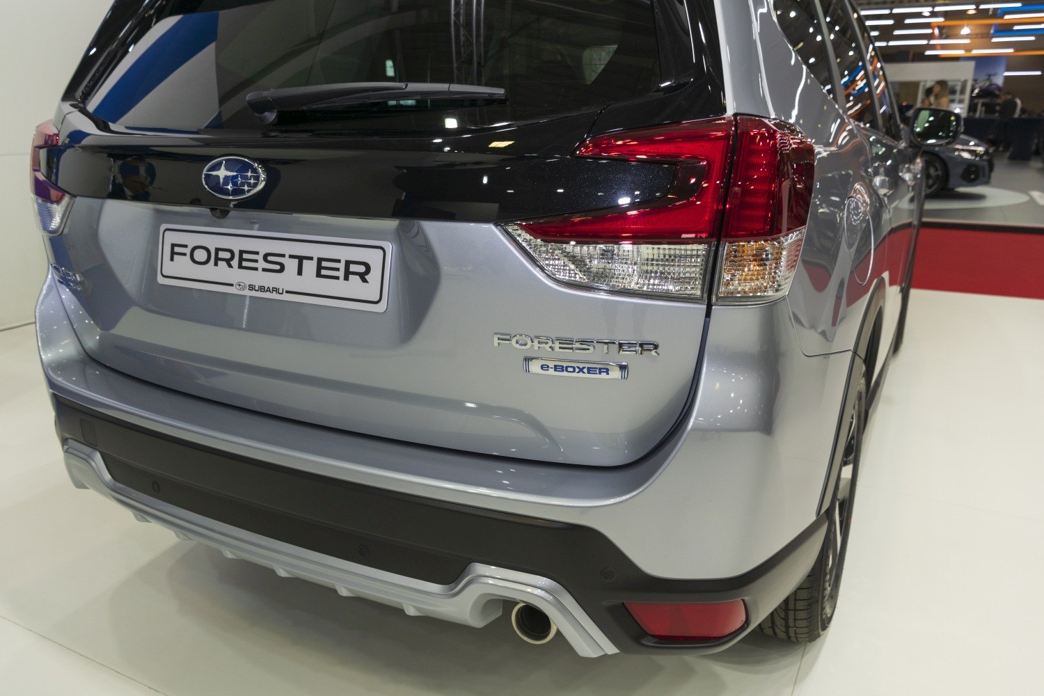 Rear close-up of SUV featuring hybrid e-BOXER badge and modern tail light design
