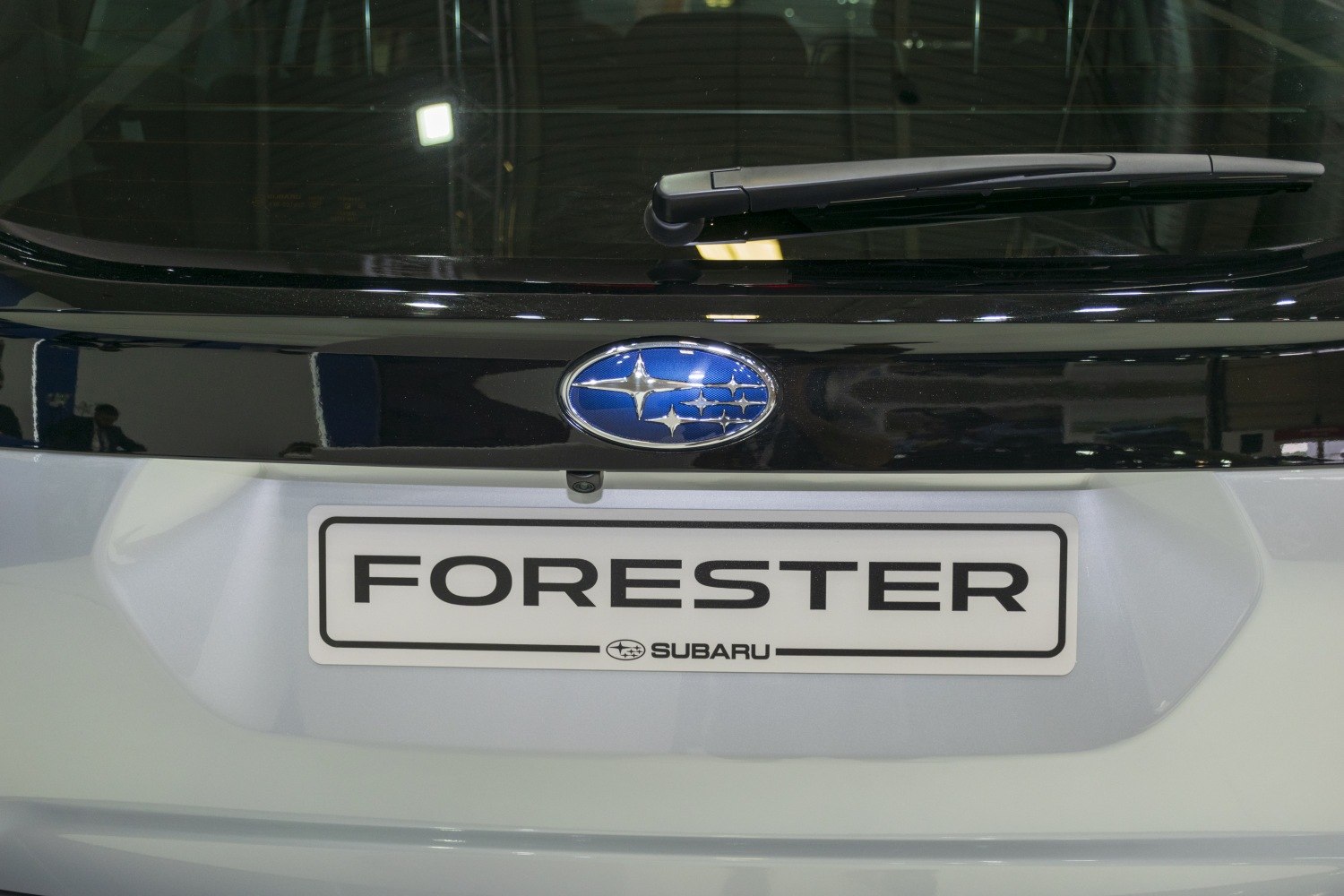 Rear Subaru badge, Forester model plate, rear windshield wiper close-up