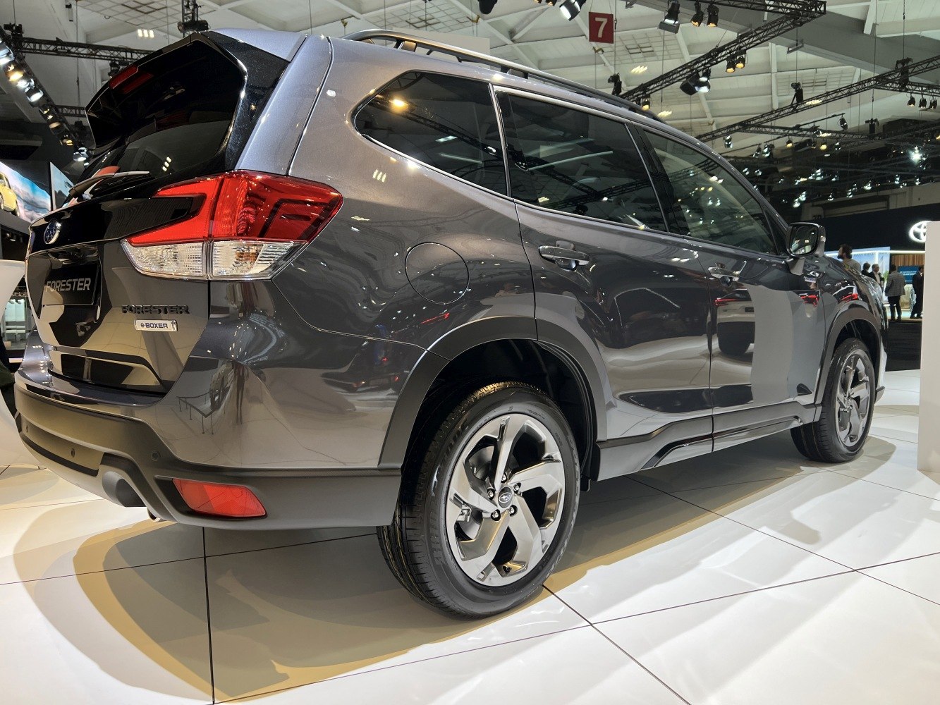 Rear and side view of SUV with alloy wheels and tinted windows
