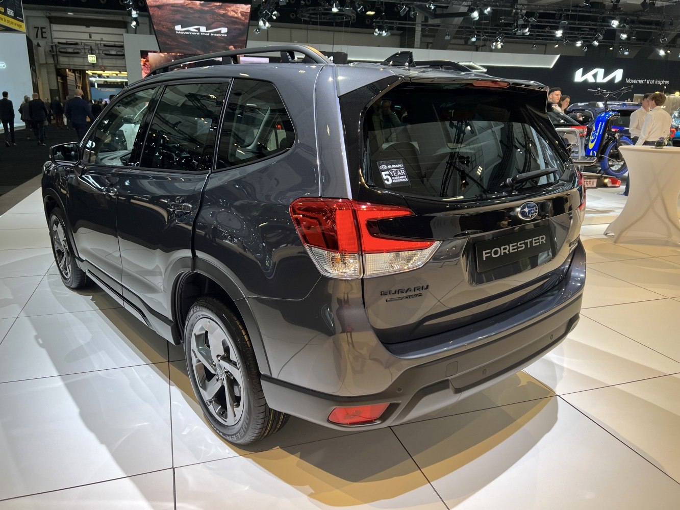 Rear and side view showing tail lights and alloy wheels
