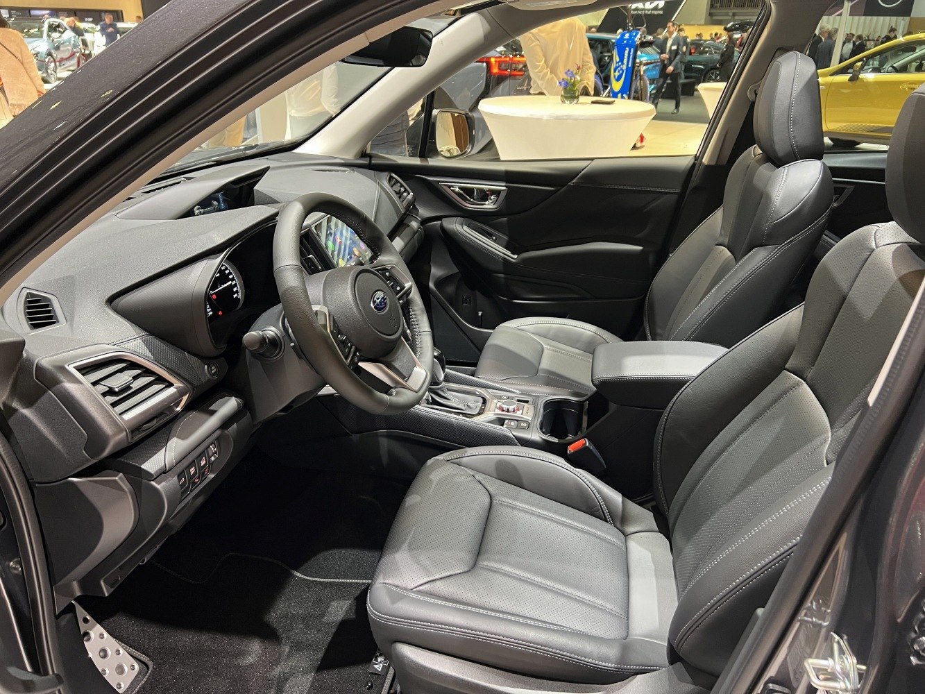Modern SUV interior with leather seats and advanced dashboard