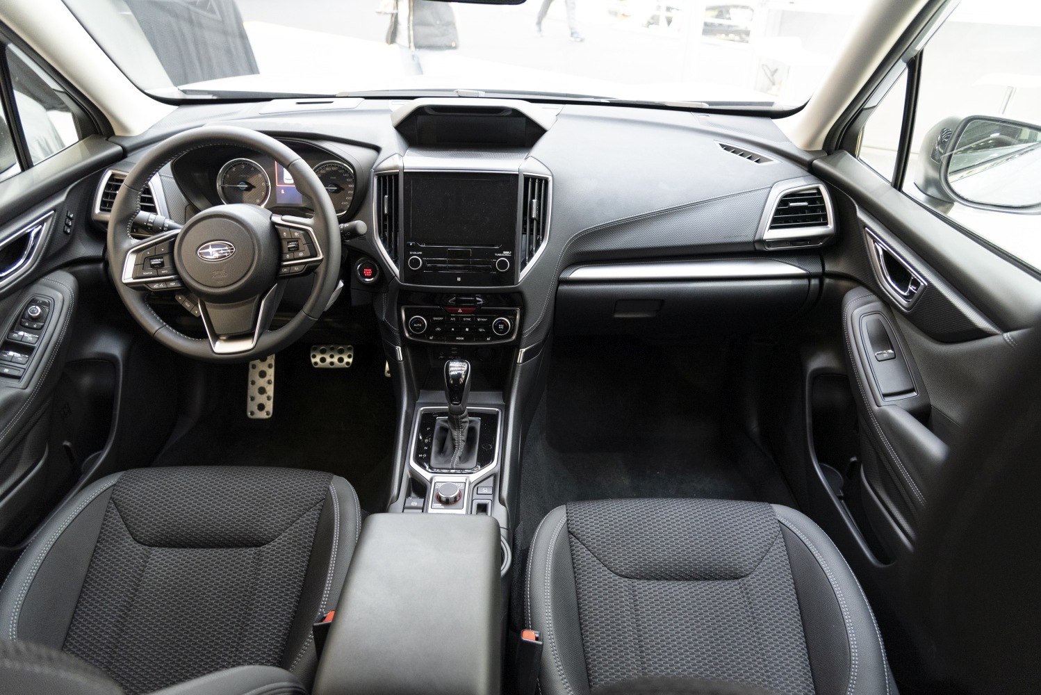 Interior dashboard with multifunction steering wheel and center console