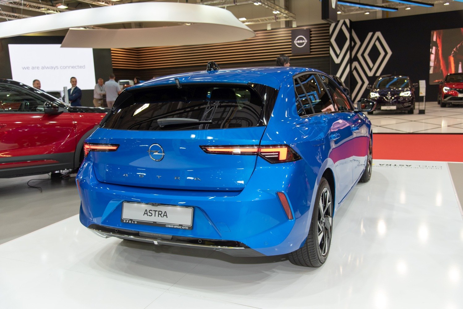 Rear view with distinctive LED taillights and hatchback design